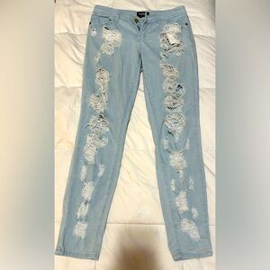 Distressed Blue Jeans by Bebe